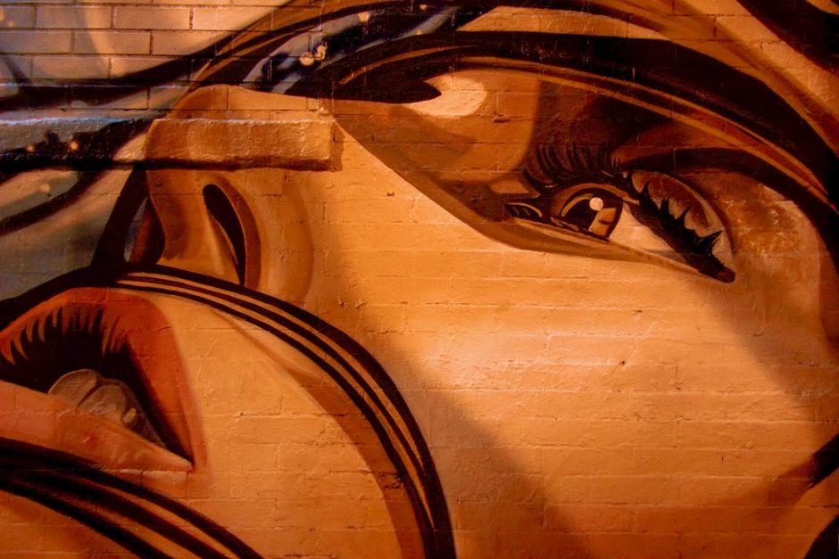Human Face Painting on Wall